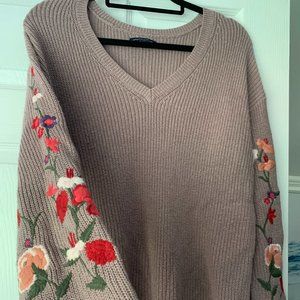 lavender sweater with floral details